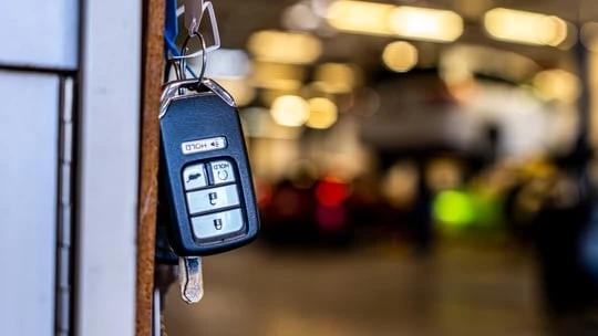 Car keys hanging from hook