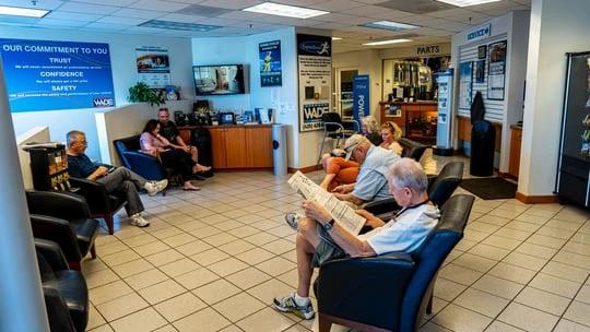 Stephen Wade customers in service department waiting room
